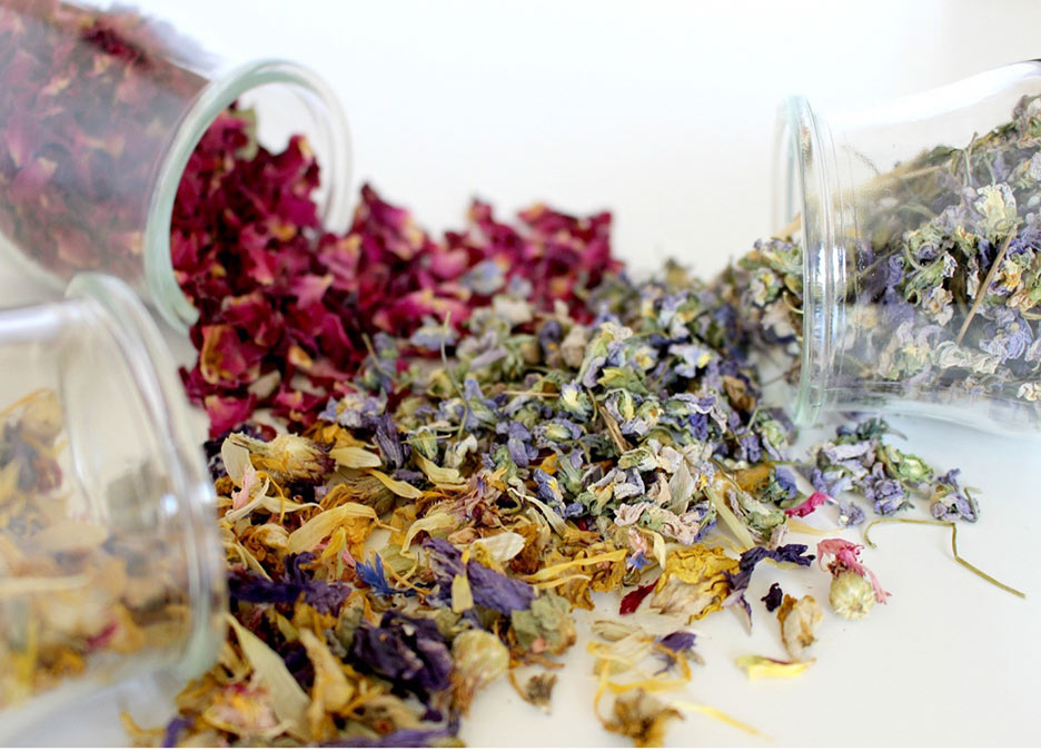 A jar with dried herbs spilling out